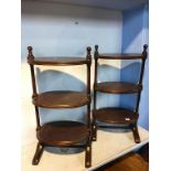 Pair of mahogany three tier stands