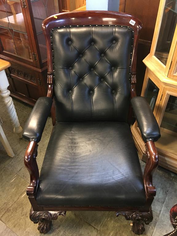 Mahogany button back armchair, upholstered in black leather
