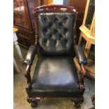 Mahogany button back armchair, upholstered in black leather