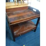 A reproduction mahogany side table, with lift off tray top