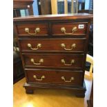 Small reproduction mahogany chest of five drawers, 56cm x 32cm x 68cm