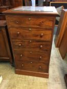 Mahogany cabinet, the opening door moulded with five dummy drawers, fitted with Bramah lock