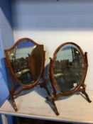 Two mahogany swing mirrors