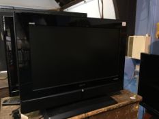 Sanyo 26" flatscreen TV, with remote and instructions