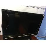 Sharp 31" flatscreen TV, with remote