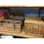 Three wicker hampers, containing assorted glass ware