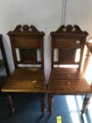 Pair of oak hall chairs