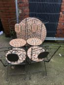 Garden table and four folding chairs