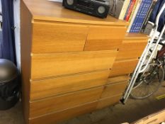 Two modern oak chest of drawers