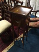 Mahogany plant stand, with silver inlay