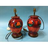 Pair of Poole lamps, 34cm high