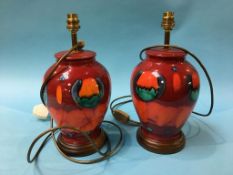 Pair of Poole lamps, 34cm high