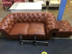 Brown leather two seater Chesterfield sofa and foot stool