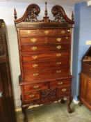 Reproduction mahogany chest on stand