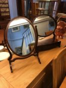 Two reproduction mahogany swing mirrors