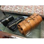 Three leather bags