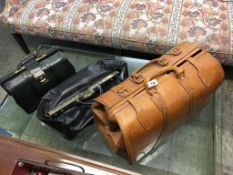 Three leather bags