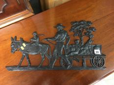 Cast metal relief plaque