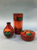 Two Poole vases and a lidded pot