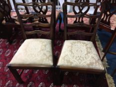 Two pairs of mahogany chairs