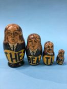 Four Russian Matryoshka dolls, modelled as the Beatles, 12.5cm to 4.5cm high