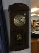 Oak cased wall clock