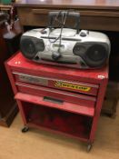 Tool cabinet and a radio