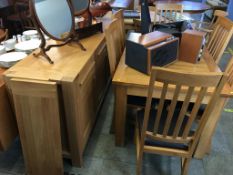 Modern oak eight piece dining room suite, sideboard, extendable table and six chairs