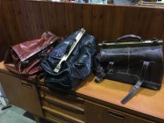 Three leather bags