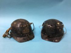 Two Miners helmets