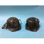 Two Miners helmets