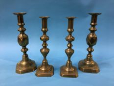 A pair of 'King of Diamond' candlesticks and one other pair