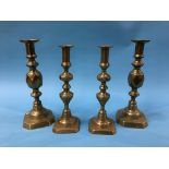 A pair of 'King of Diamond' candlesticks and one other pair