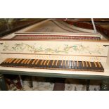 A harpsichord by Colin Booth, with dark green outer case and brass hinges, the lid opening to reveal