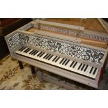 A Harpsichord by Robert Deegan of Lancaster, with grey and red outer case, the lid opens to reveal a