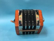 A modern German concertina and box