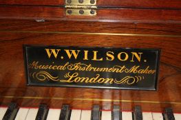 A mahogany square piano by W. Wilson of London, with cross banded case, decorative fretwork and