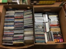 Two boxes of CDs