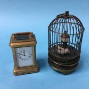 Mini brass carriage clock and an automation bird cage clock (2)