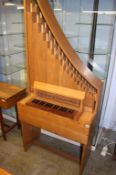 An electric action oak cased organ. 83cm wide x 187 height