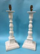 A pair of pottery lamps