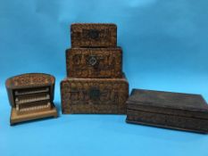 Three graduated carved boxes, a carved jewellery box and a cigarette box