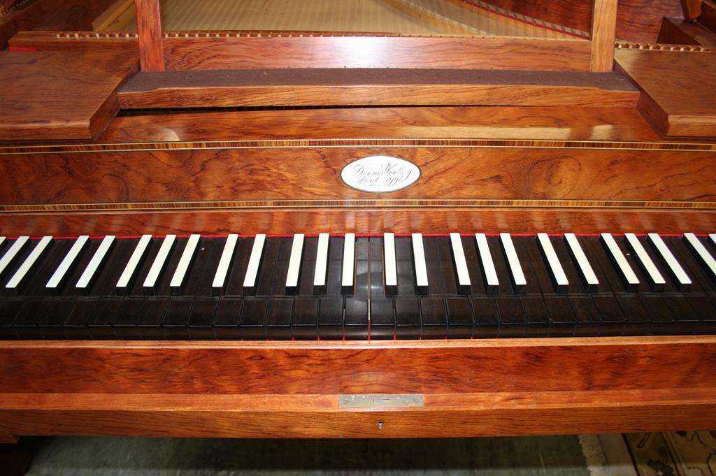 A piano by Dennis Woolley Dent (dated 1994), in a walnut case, supported on square tapering legs. - Image 2 of 9