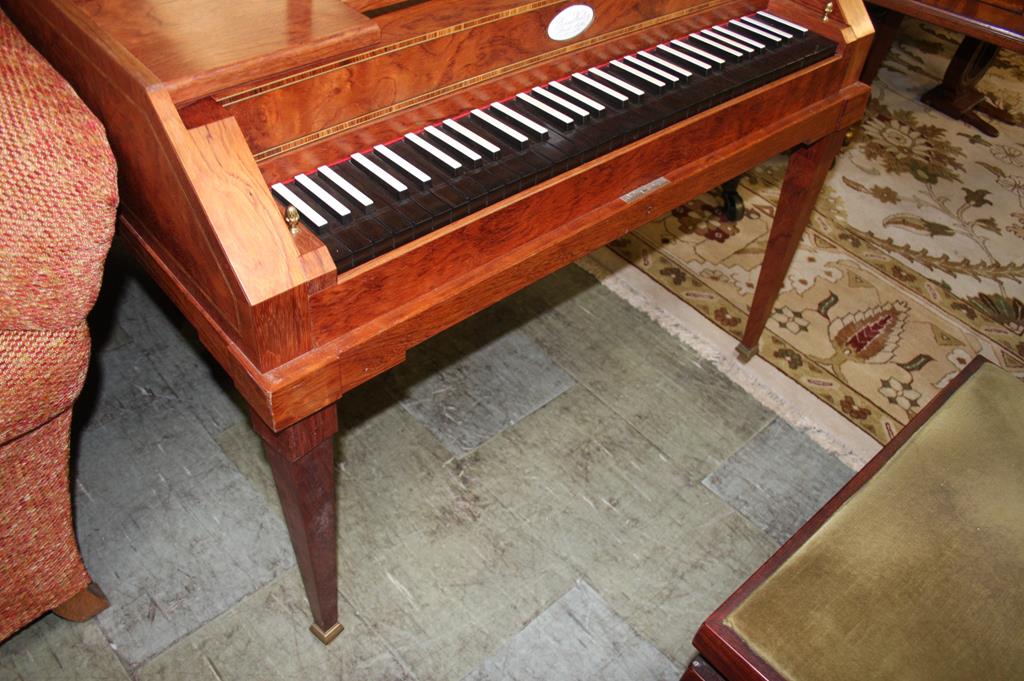 A piano by Dennis Woolley Dent (dated 1994), in a walnut case, supported on square tapering legs. - Image 5 of 9