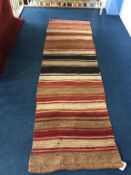 A hand knotted wool runner