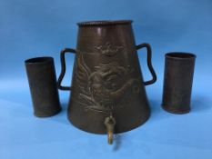 Two trench art engraved shell cases and a copper tapering and embossed water carrier