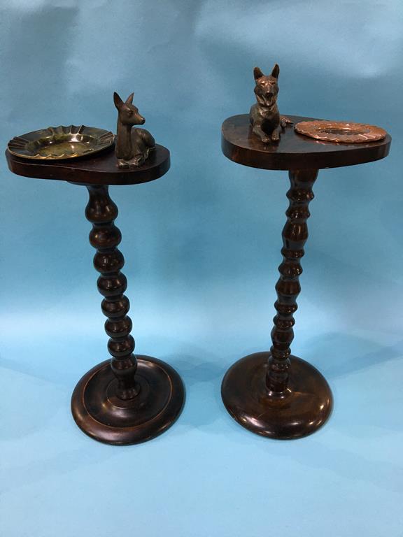 Two turned wood ashtray stands, each surmounted with a dog on one and a fawn on the other