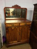 A mahogany mirror backed sideboard