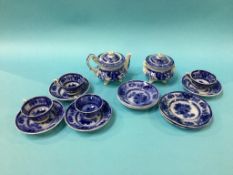 A Victorian blue and white china child's tea set comprising; four cups and saucers, two saucers, two