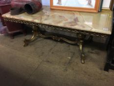 Large onyx and heavy brass coffee table